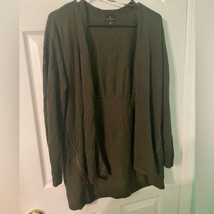 Olive green open cardigan with zipper detail. Lightly worn